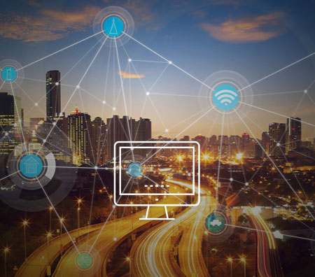 Graphic of a cityscape with computer icon on top